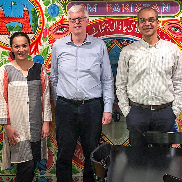 Scott in Pakistan with Oxford Policy Management colleagues for an evaluation project, 2019